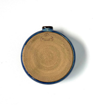 Ceramic lather bowl viewing from bottom with Captain's Choice stamp.